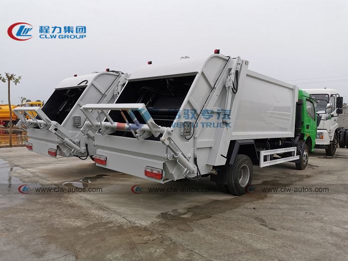 self compressed garbage truck