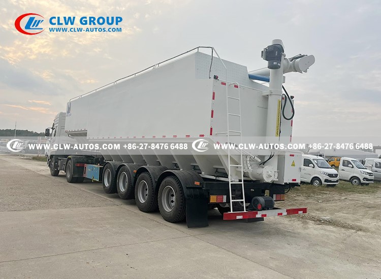 Bulk feed delivery trailer with front two liftable axle
