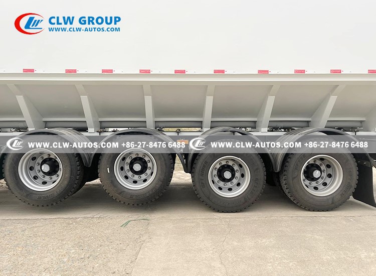 Bulk feed delivery trailer with multiple compartments
